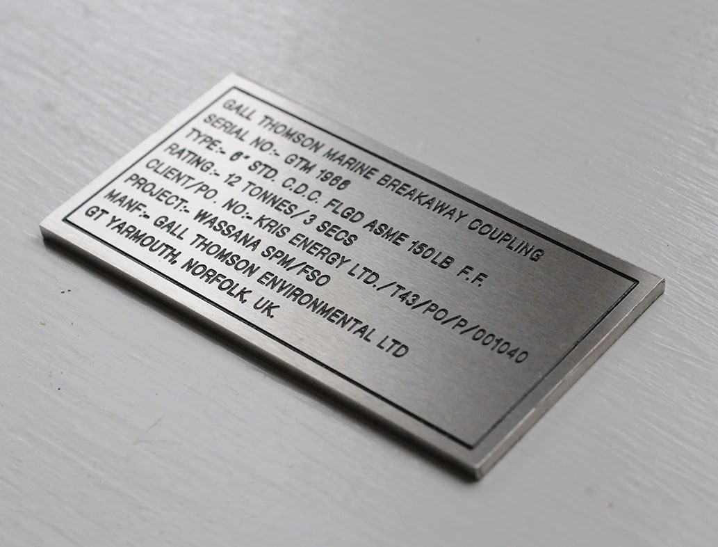 Informational engraved metal plate